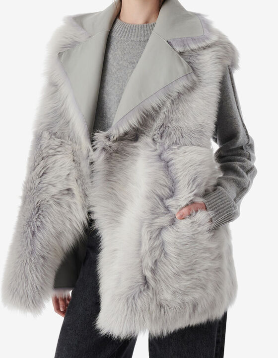 REVERSIBLE SLEEVELESS JACKET
