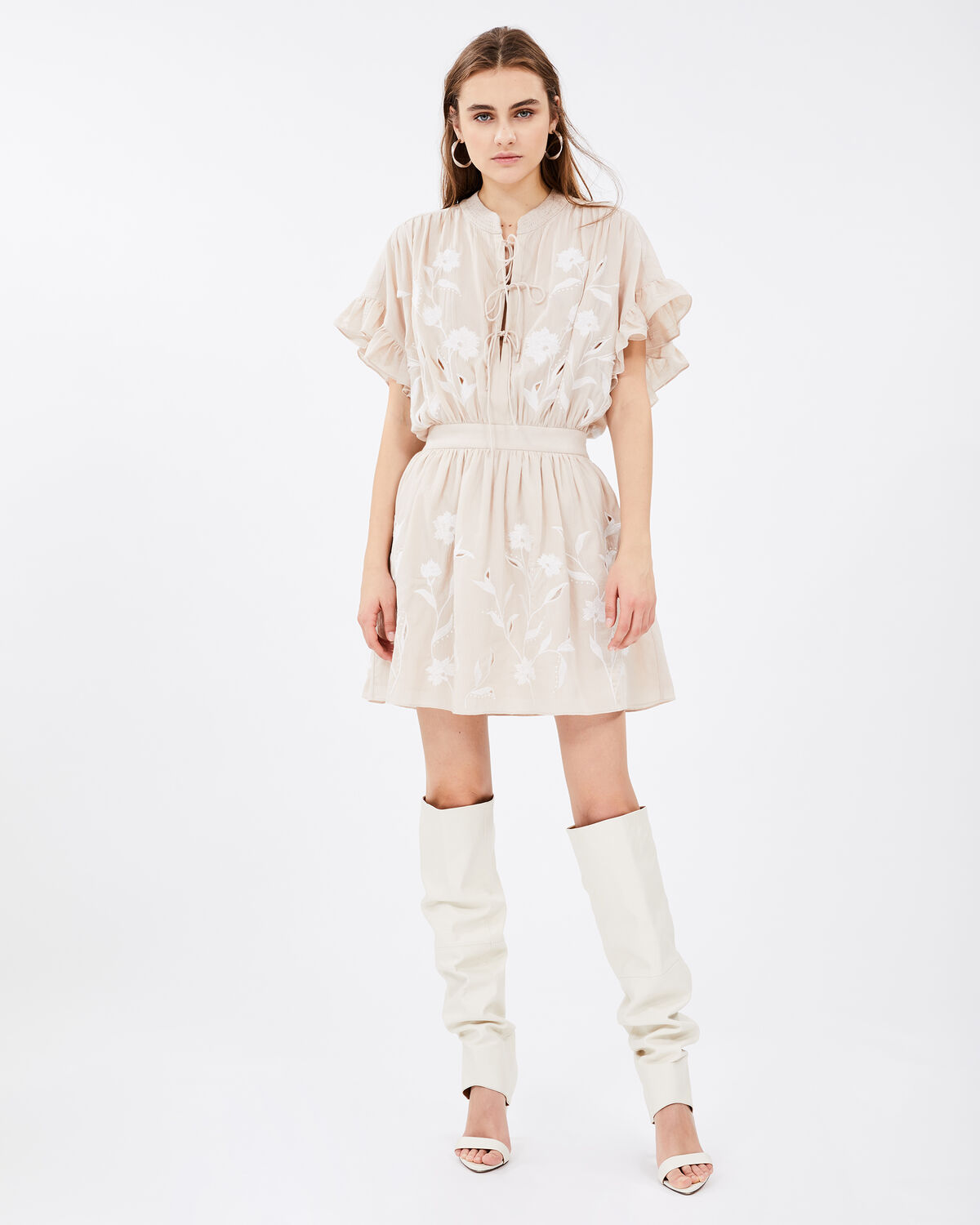 Photo of IRO Paris Kauri Dress Nude - This Dress Is Distinguished By Its Lacing And Embroidery. With Its Oversized Cut And Elastic Waist, It Will Bring A Bohemian Touch To Your Outfits. Wear It With A Pair Of White Boots For A Resolutely Modern Look. Dresses