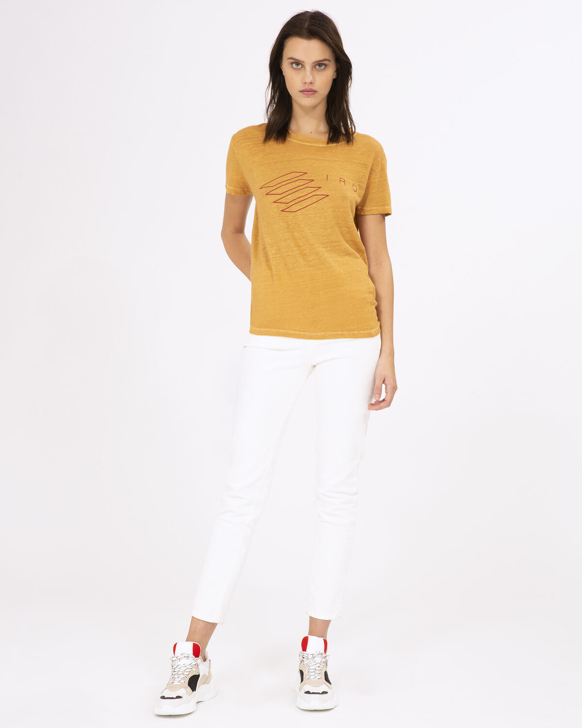 Photo of IRO Paris Lucie T-Shirt Safran - This Season, Iro Revisits Its Timeless Linen T-shirt And Offers A Resolutely Modern Silkscreened Version. With Its Graphic Logo, This Top Will Perfectly Match Jeans And A Pair Of Dad Shoes For A Casual Silhouette. Spring Summer 19