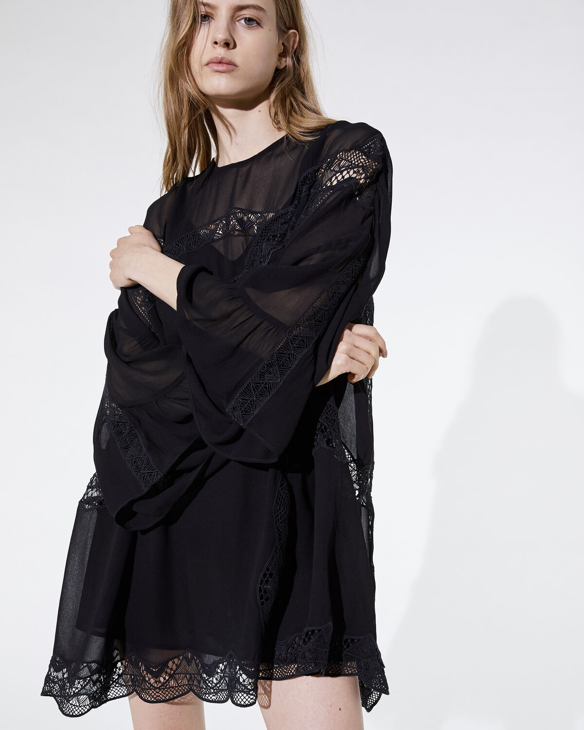 Photo of IRO Paris Farila Dress Black - Fluid And Airy, This Dress Will Bring The Bohemian Chic Touch To Your Outfits. It Is Sublimated By Its Transparency, Wide Sleeves And Lace Details. Dresses