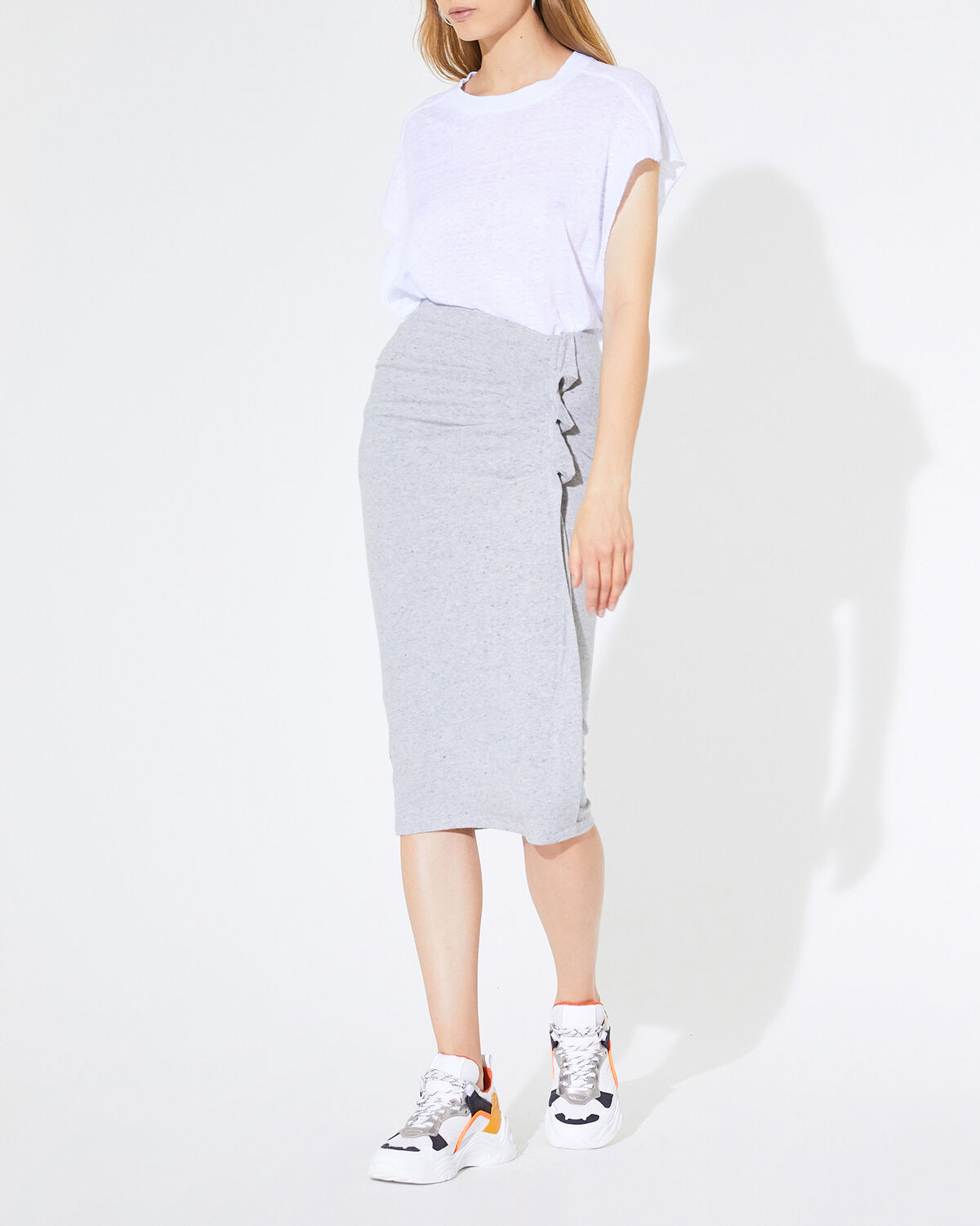 Photo of IRO Paris Wilber Long Skirt Mixed Grey - Dare To Wear The Chic Sportwear Look With This Long Skirt Close To The Body. It Is Distinguished By Its Pleats And Side Ruffles. Wear It With A Pair Of Vintage-inspired Sneakers. Fall Winter 19