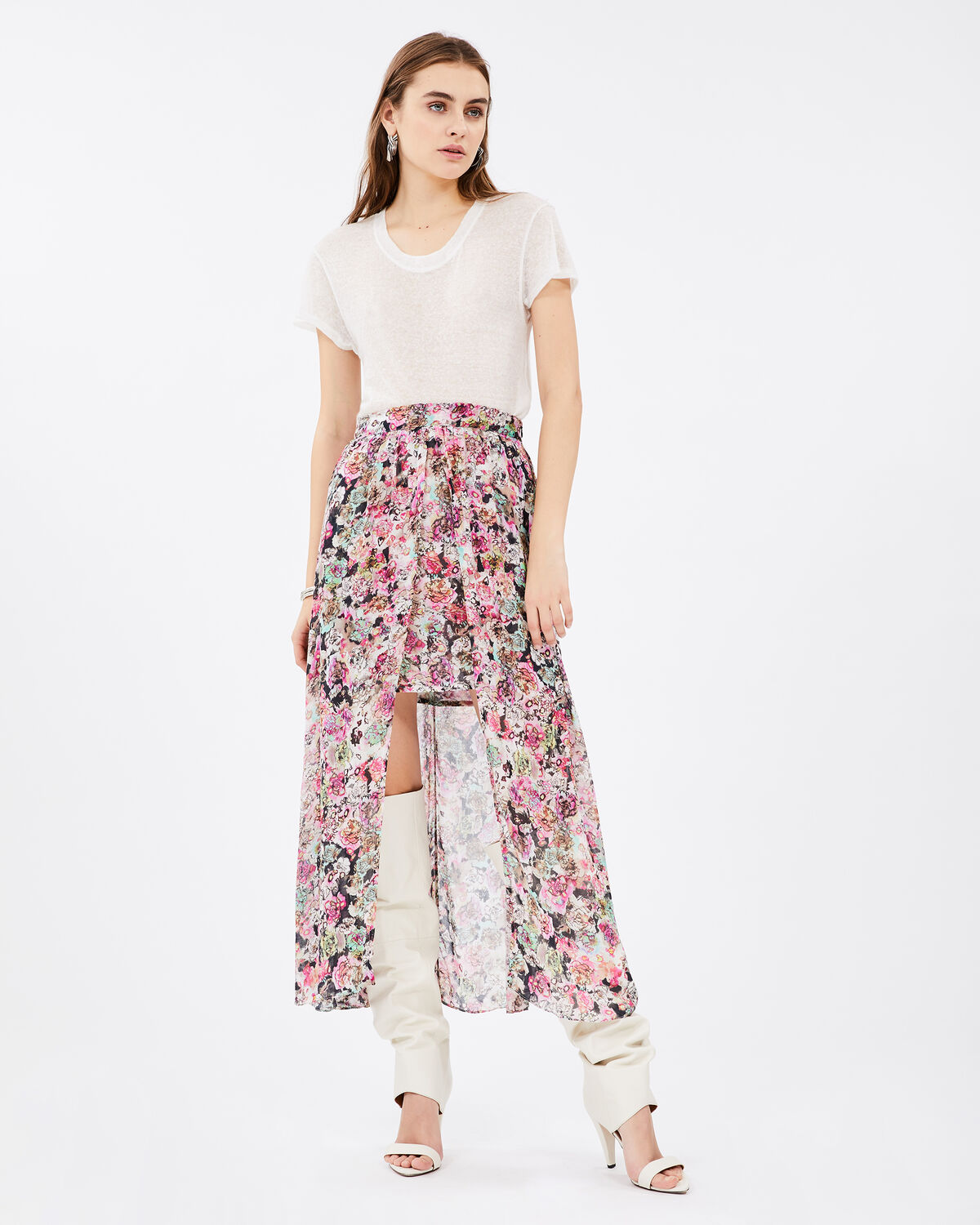 Photo of IRO Paris Trent Skirt Pink - With Its Elastic Waist, This Long, Fluid And Airy Skirt Is Distinguished By Its Floral Print And Asymmetry. Enhanced By Its Play Of Transparency Due To Its Petticoat, It Enhances Your Silhouette In All Circumstances. Wear It With A Linen T-shirt And A Pair Of Boots For A Sunny Look. New In