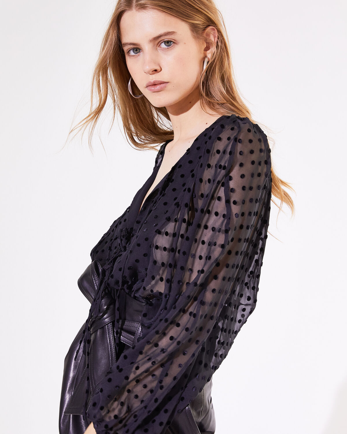Photo of IRO Paris Arion Top Black - Structure Your Silhouette With This Marked Waist And Bat Sleeves. It Is Sublimated By Its Plumetis And Its Neckline To Open As You Wish. Fall Winter 19