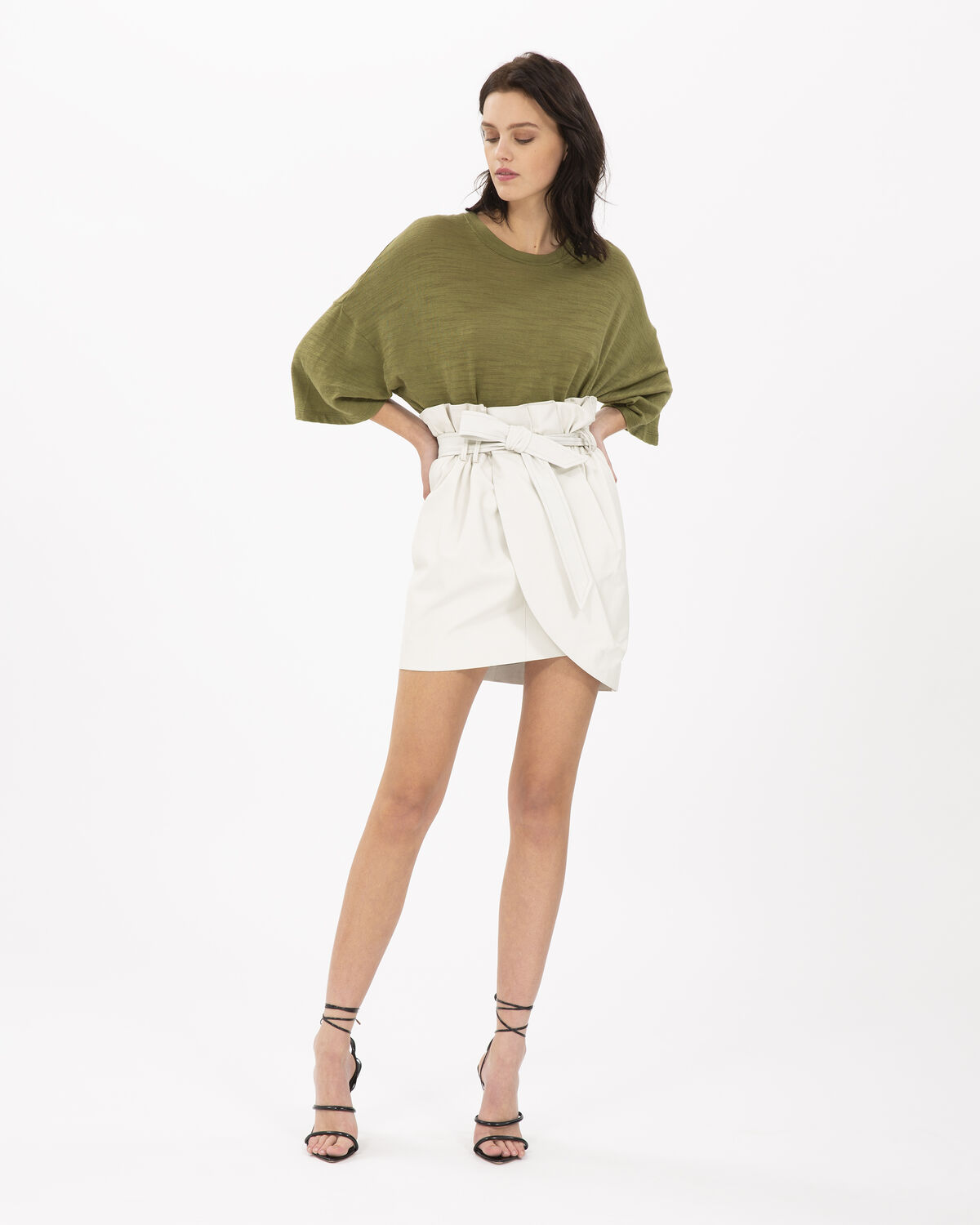 Photo of IRO Paris Silva Skirt Ecru - This Leather Wallet Skirt Features An Integrated Belt To Mark Your Waist And Its Pleating Work. During The Day For A Working Girl Look Or At Night For A Chic Rock Look, It Will Adapt To All Your Outfits. Skirts-Shorts