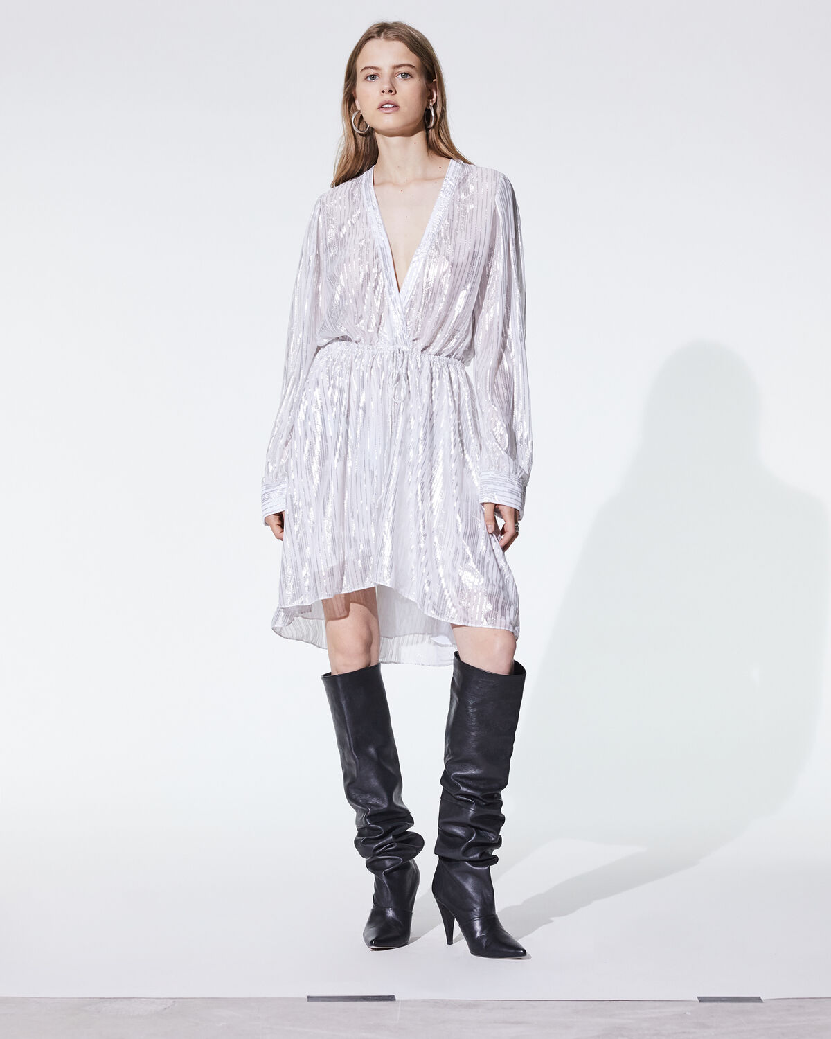 Photo of IRO Paris Chumy Dress Ecru And Silver - Tightenable At The Waist With Its Silvery Lurex Stripes, This Wrap Dress Is Perfect For The Mid-season. Fluid And Lightweight, Wear It With A Pair Of Boots To Add A Rock Touch To Your Outfits. Dresses