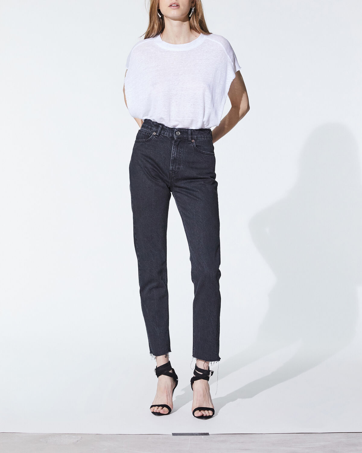 Photo of IRO Paris Famy Jeans Black And Grey - These Straight Cut High Waist Raw Pants Are A Basic Part Of The Women's Wardrobe. They Are Sublimated By Their Frayed Edges. Fall Winter 19