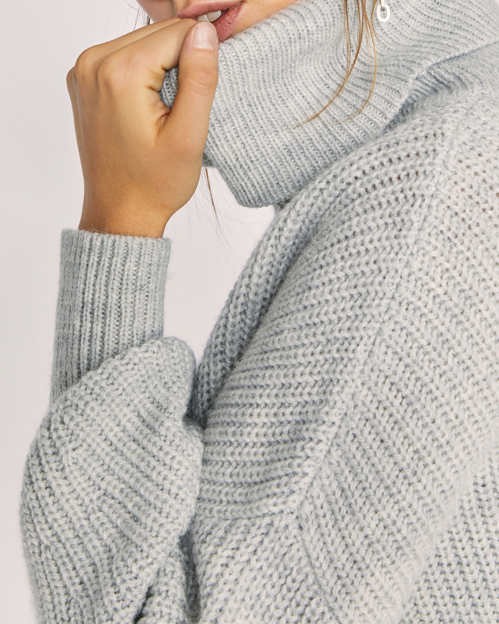 light grey turtleneck sweater