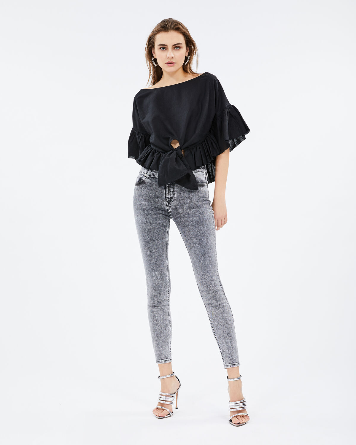 Photo of IRO Paris Linn Top Black - This Oversized Linen Top Is Distinguished By Its Drooping Shoulders, Wide Flared Sleeves And Multiple Flounces. Wear It With High Waist Pants For A Feminine And Modern Allure. Its Plus? Tie It At The Waist To Mark Your Silhouette. Spring Summer 19