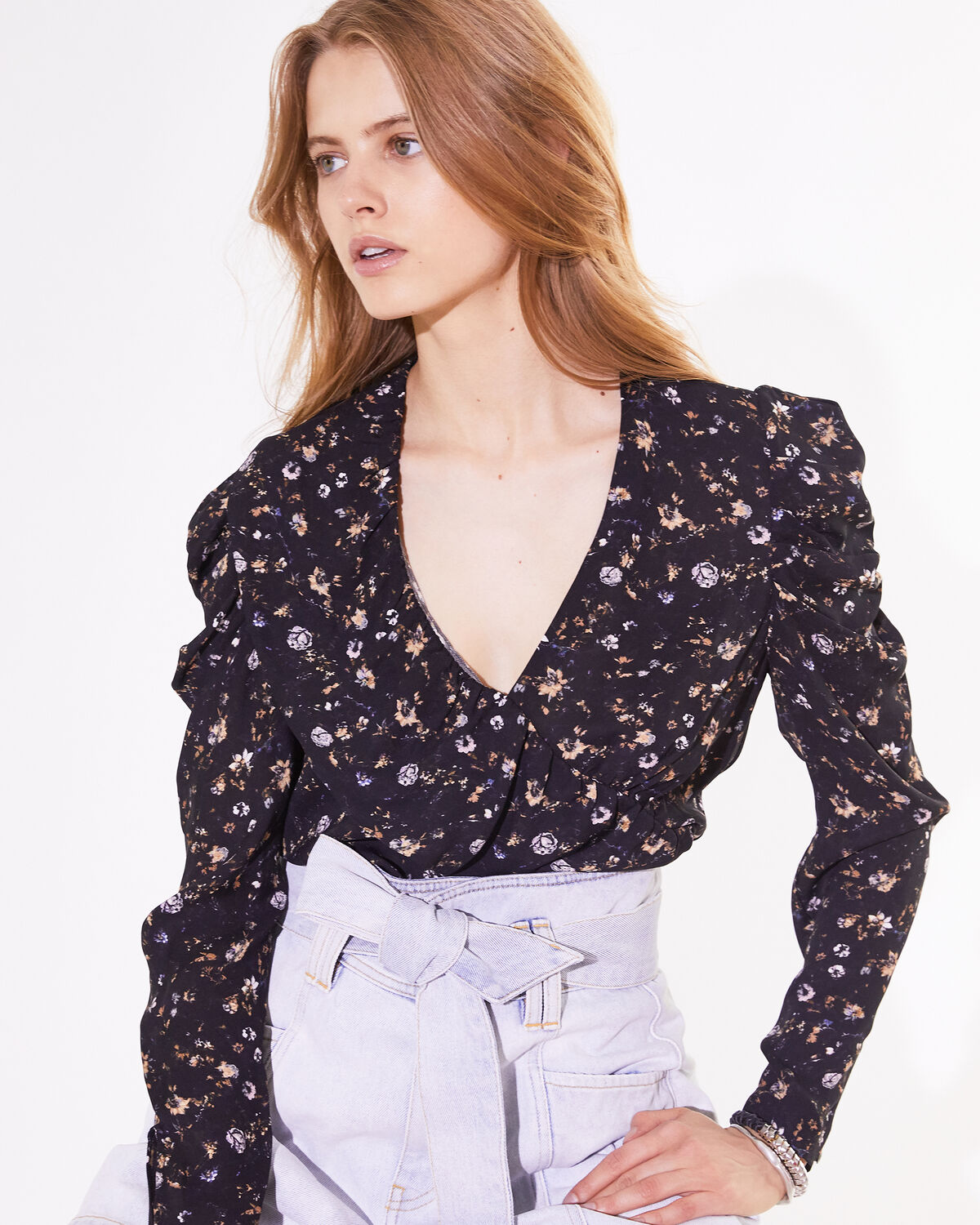 Photo of IRO Paris Syrup Top Black And Orange - With Its Floral Motif, This Top Is Sublimated By Its Flounced Neckline And Puffy Shoulders. Wear It With Faded High Waist Pants For A Feminine And Modern Silhouette. Fall Winter 19